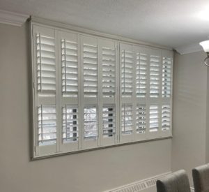 California shutters installed on large windows in Brooklin Ontario home