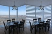zebra blinds installed in toronto condo living room skyline view