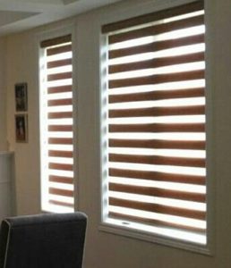 Close up of zebra blinds showing alternating sheer and solid fabric layers
