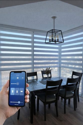 Motorized blinds in modern Toronto home controlled by smartphone