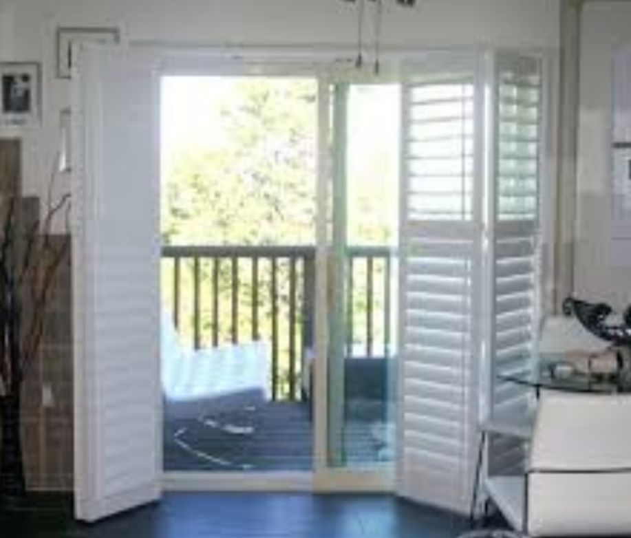 Zebra blinds on patio doors in modern Toronto home