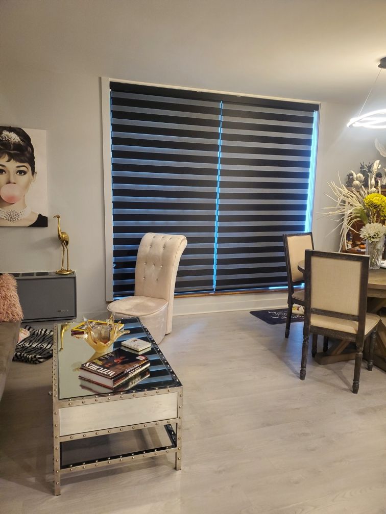 Blackout blinds installed in a Muskoka cottage guest bedroom by Shutter Outlet