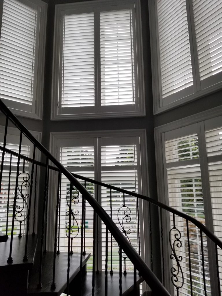 Cottage vinyl shutters vs wood shutters in Ontario lakefront homes