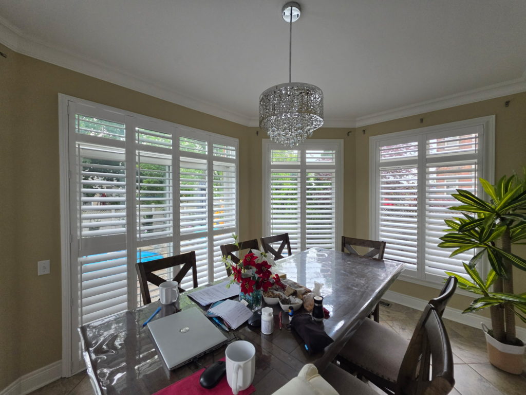 Coordinated room-by-room window treatments in a Toronto home