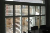 Large windows with white plantation shutters in Toronto and Southern Ontario.